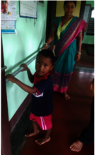 Mother performing home based exercises