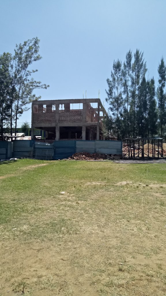Help complete the construction of classrooms Block