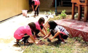Working together to clean the grounds