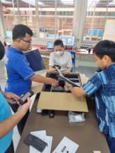 Assembling computers donated by Microsoft