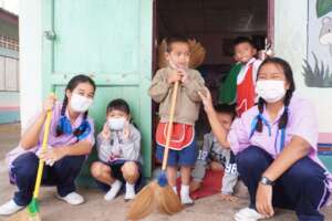 Helping young children at a charity school