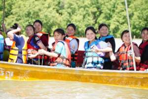 Planting mangrove trees and releasing shellfish