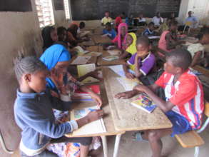 Children reading books on traditional story tales