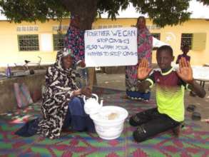 Grandmothers teach children COVID-19 prevention.