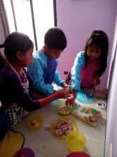 Male and female students preparing their own snack