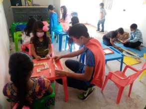 Students enjoying the games in the Games Room