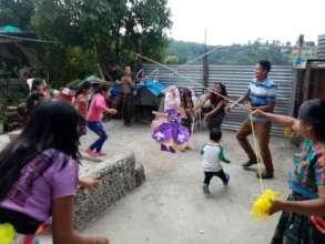 Students enjoying pinata