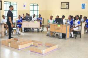 STEM Instructor delivering a lecture to students