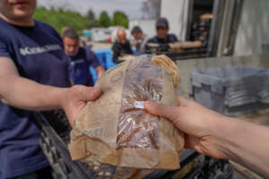 Warm whole grain bread is a hit with refugees