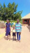 social worker at a child's school with a teacher