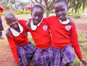 Group of Girls Showing Off Their New Uniforms