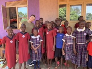 Volunteer and group of students
