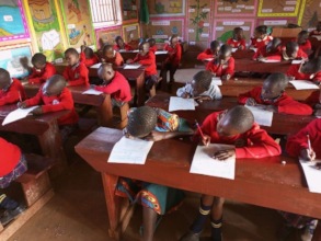 Children Working on Their Latest Round of Exams