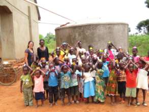 Children with the water tank