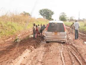 Noah stranded in muddy with Fruit seedlings inside