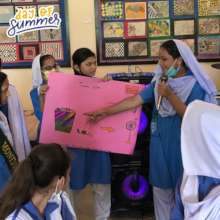 Students present an idea on recycling