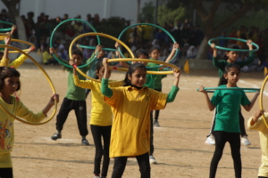 Students display hula hoop skills on Sports Day.