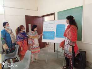Teachers participate in a training activity