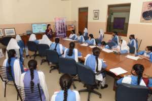Students attend a talk on Alzheimer's awareness