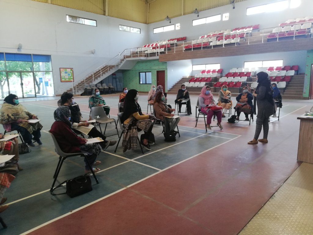 KPS teachers intently listening to the counsellor.