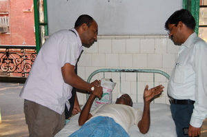 Mamoon with the elderly patients at Hospital
