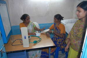 Slum women getting treatment