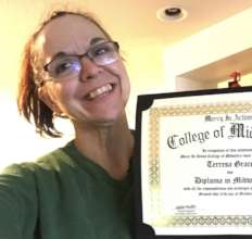 A proud graduate who is now a CPM Midwife!