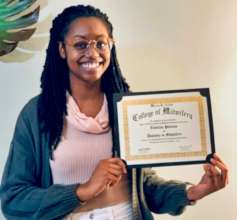 A proud graduate who was helped by the Scholarship