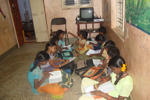 The living room-children study, eat and sleep here