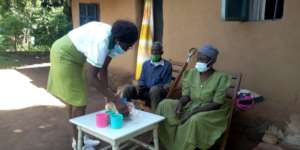 Our caregiver enjoying tea with our client.
