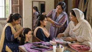 women learning hairstyling and salon skills