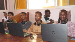 Boys use Elimu laptops to pursue Cisco courses.