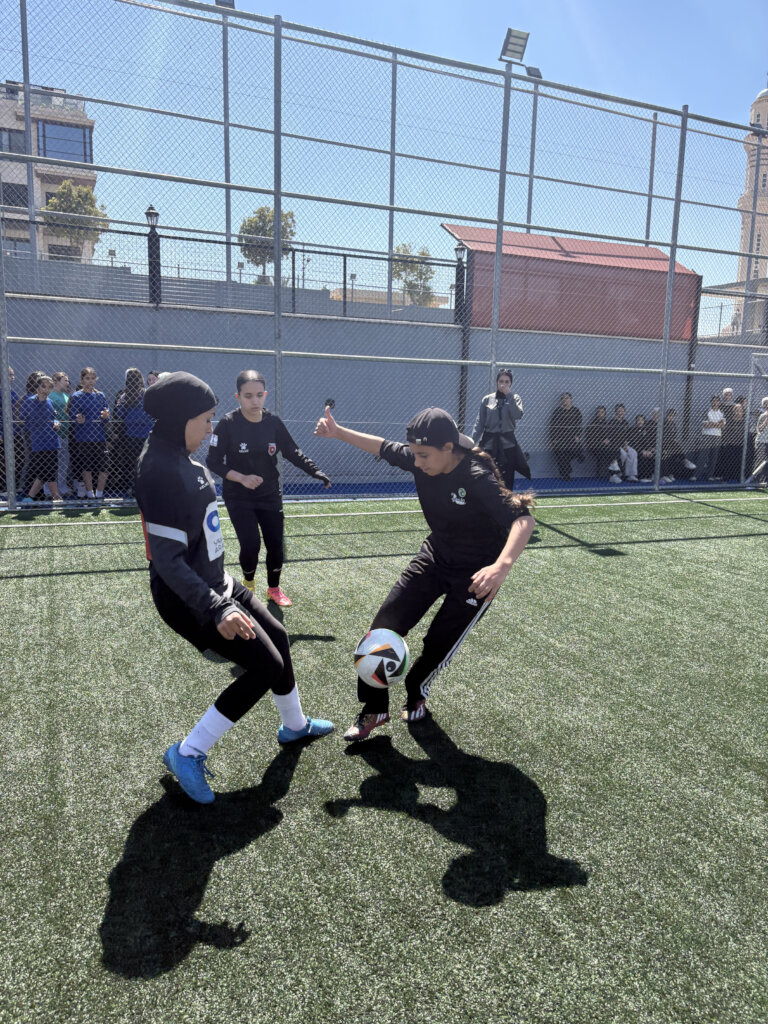 Girls hit the field at the Amman Play Day!