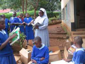 Students excited about books donated by COCE