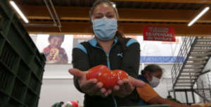woman receiving food support