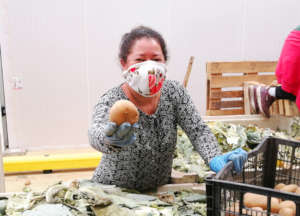 woman receiving food support
