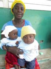 Sanatus with her brother, after treatment