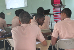 Genel working with a classmate