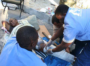 IMC staff providing medical care