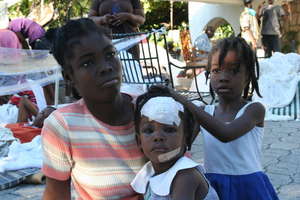 Young Haitian girl being treated by