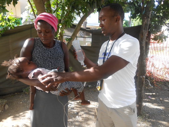 Providing cholera treatment to an infant