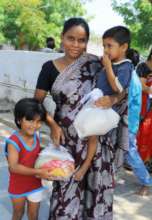 A lockdown family gets food packages from BASS