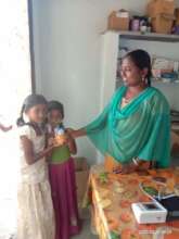 BASS distributing immunity capsules to children