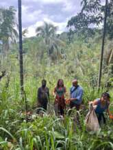 Planting a tree on our newly acquired land!