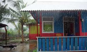 The front view of the house in Petobo painted