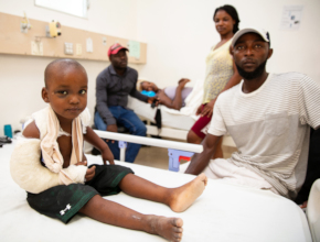 Louine (4 years old) receives medical care at HUM