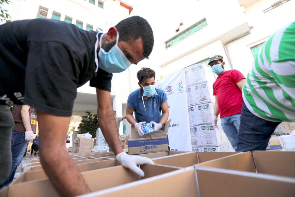 Partners packing the boxes last year