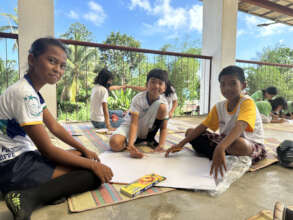 Girls participate in poster-making contests.