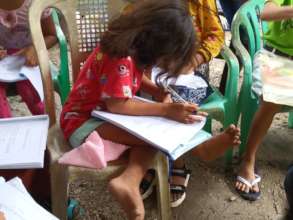 Girl doing work during mentorship session