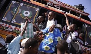 Haitians frantically board tap-tap to leave Port-au-Prince